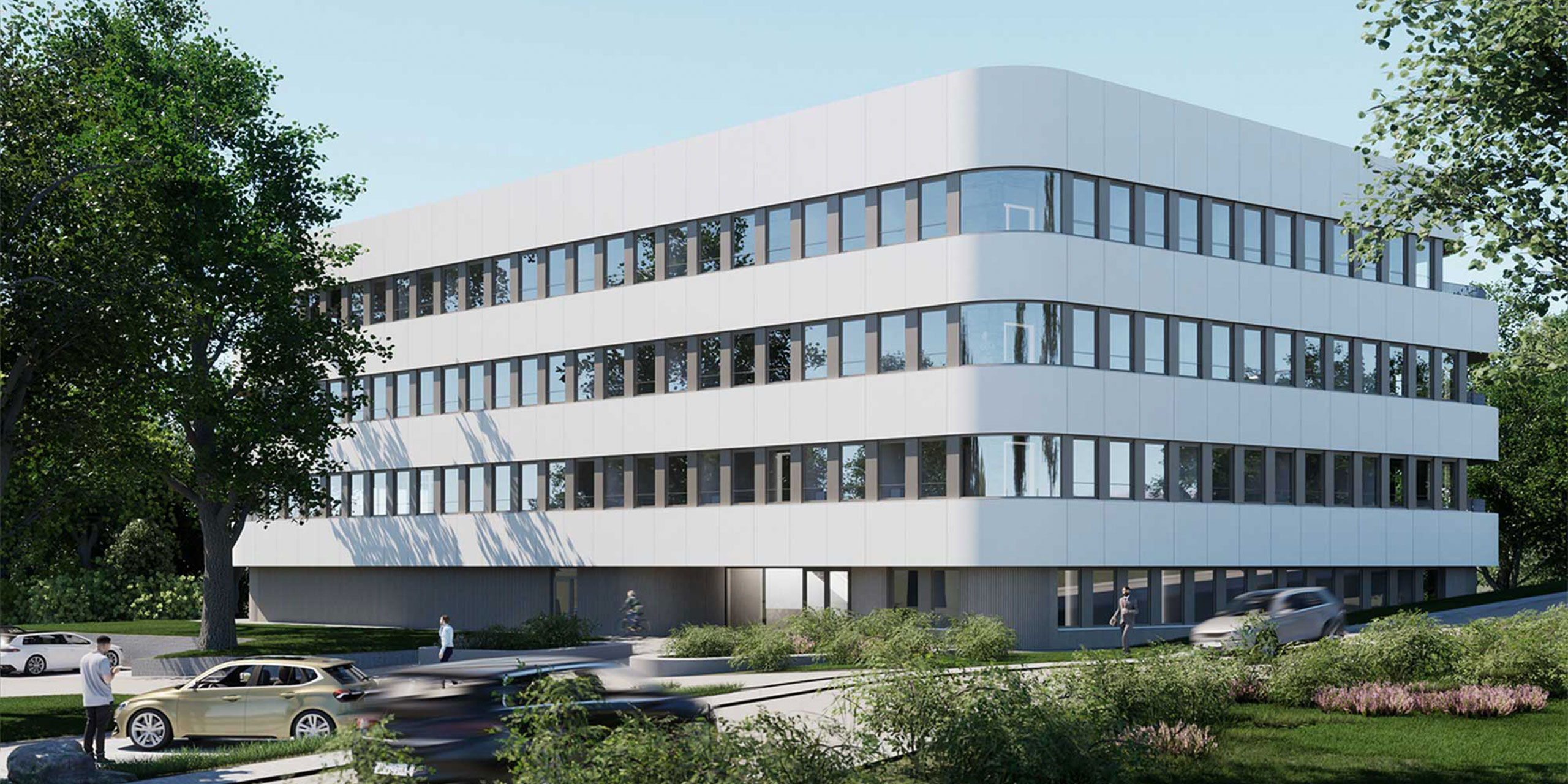 Außenansicht des Ruhrtalbogen mit vorgelagerter Grünfläche und Parkbereich